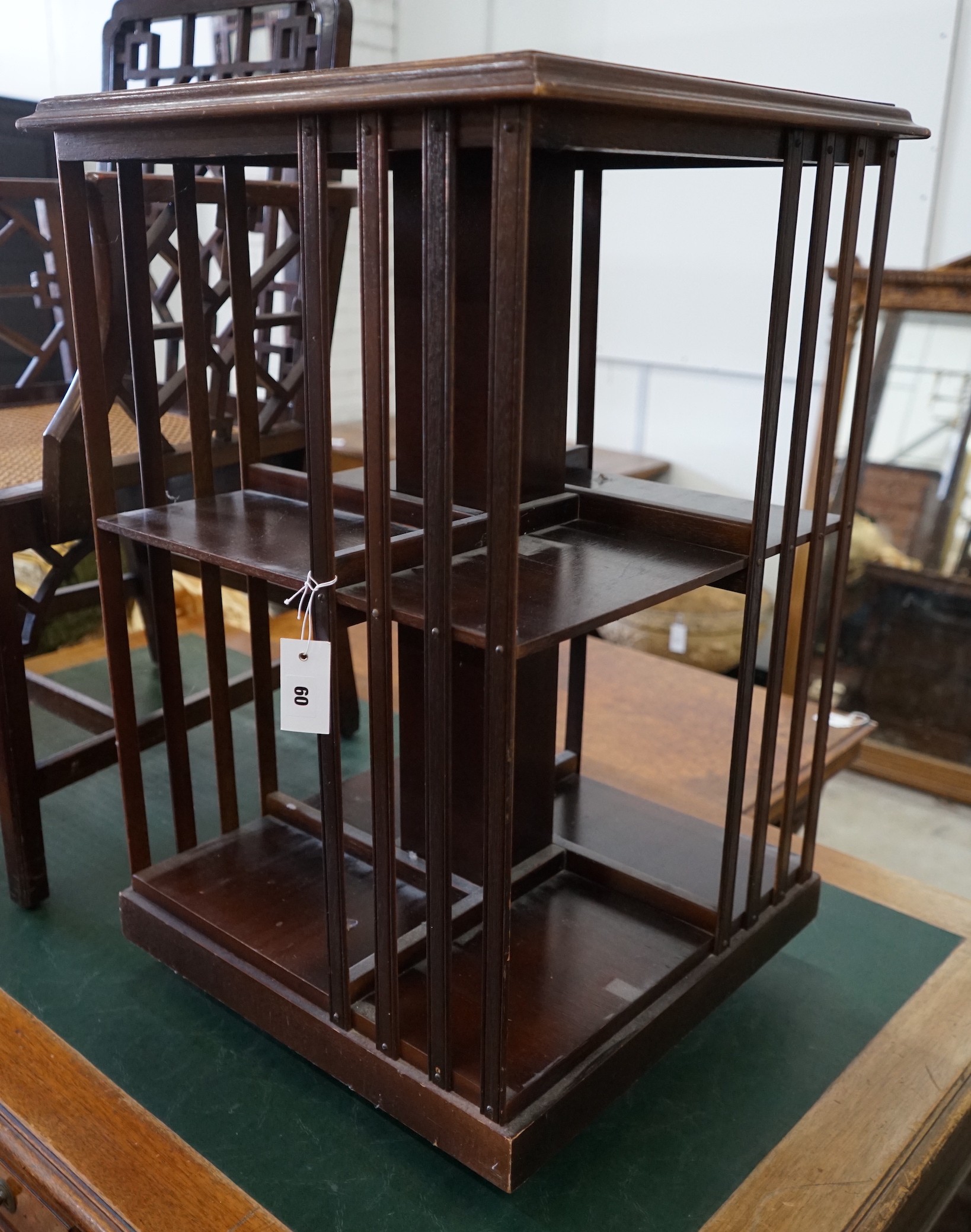 An Edwardian style mahogany revolving bookcase, width 50cm, height 78cm